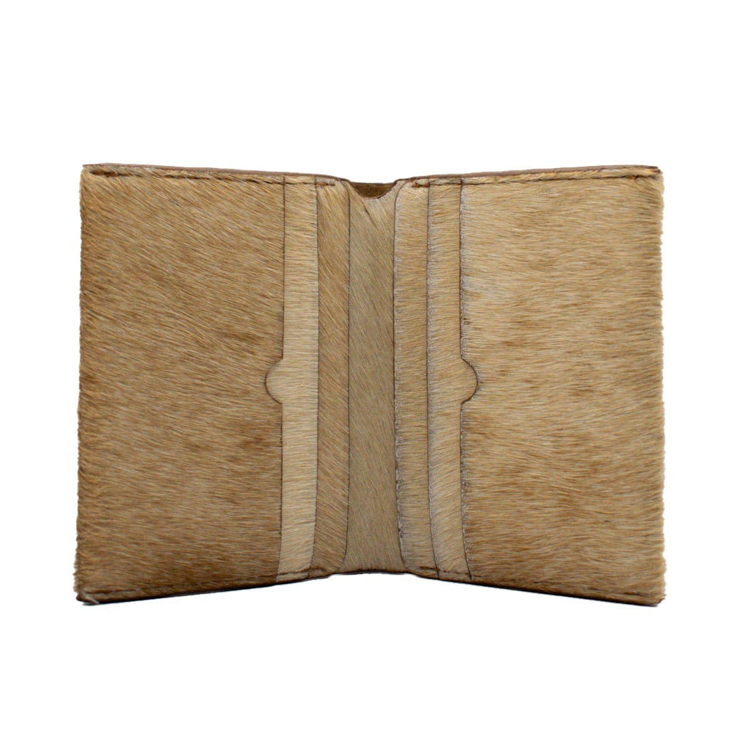 Open beige Hairon leather wallet on a white background