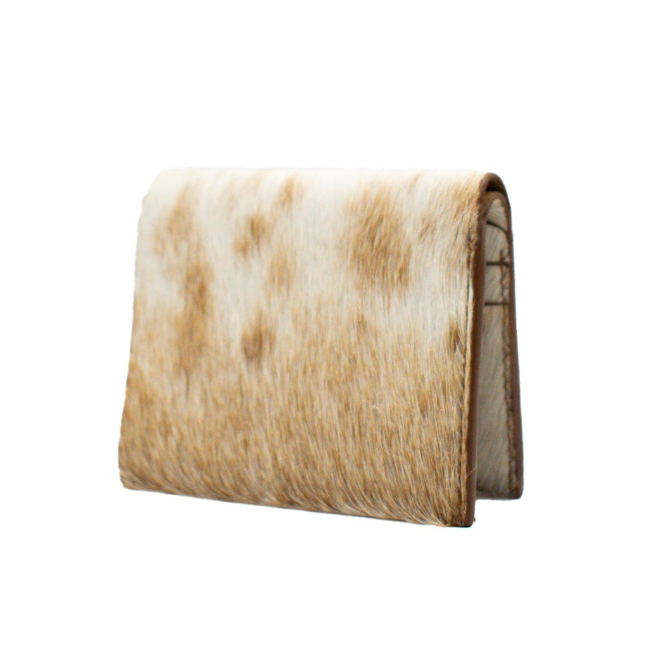 Cow Hair on Hide Bifold Wallet on a white background