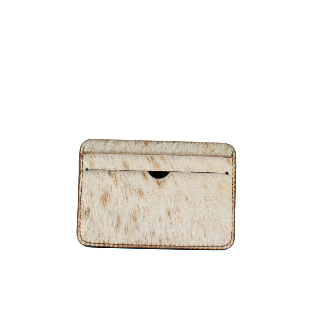 natural cow print cardholder with a natural finish on a white background