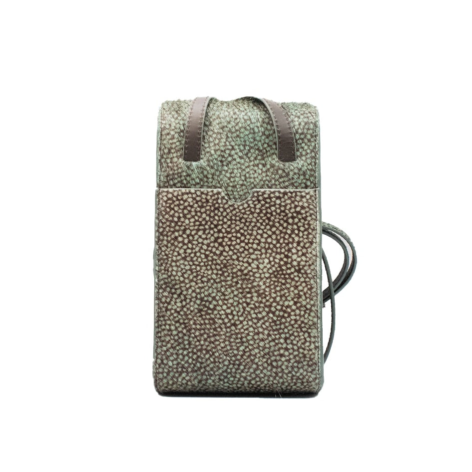 Green dotted brown hair on hide phone bag on a white background