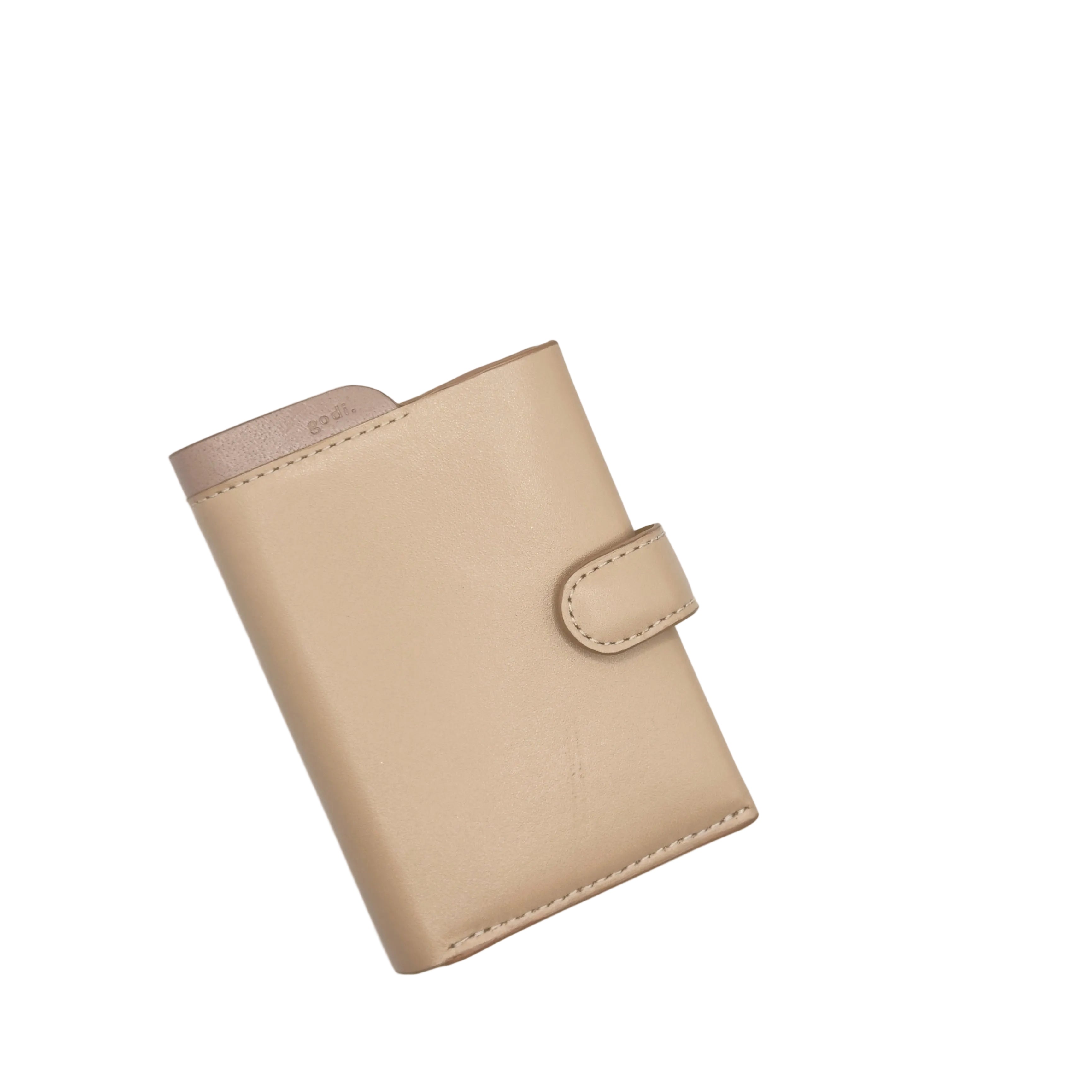 Nude Pink wallet on a light gray background