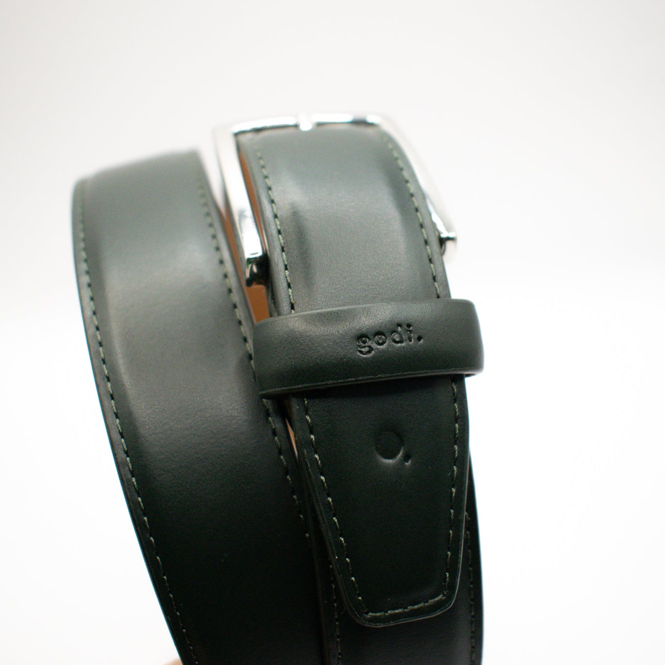 Green leather belt with a visible brand logo on a white background