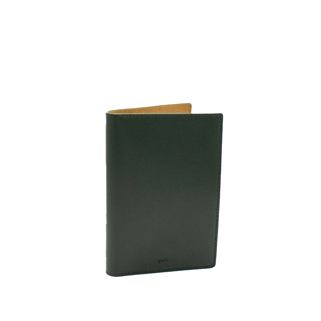 Dark green leather Passport Cover on a white background