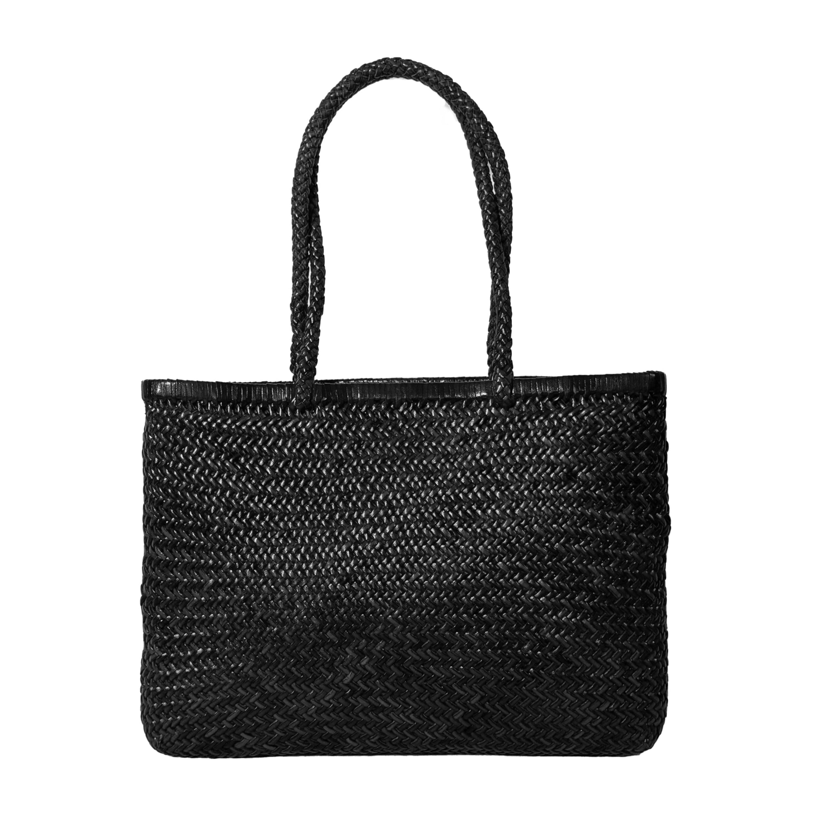 Black woven handbag on a white background